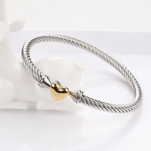 Titanium steel simple heart shape bangle.