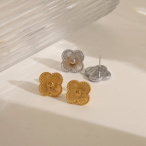 Boucles d'oreilles florales vintage élégantes dorées.